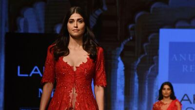 A model in a vibrant Anushree Reddy creation. AFP