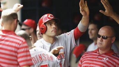 Joey Votto, centre, of the Cincinnati Reds, is deserving of the votes he has received by the fans to start Major League Baseball's All-Star Game.