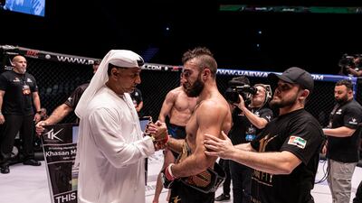 Abdulmunam Al Hashemi, chairman of Palms Sports, with Mohammad Yahya, after presenting the belt.