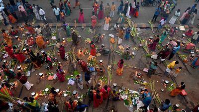 Women in Mumbai cook rice during a ceremony to celebrate the Hindu harvest festival of Pongal. AFP