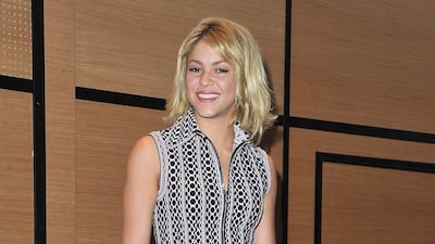 Shakira, in a zip-up printed mini, arrives at Hotel Majestic on January 28, 2012 in Cannes, France. Getty Images