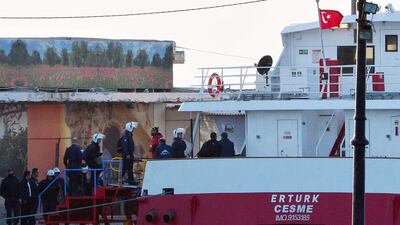 Greek anti-riot police embark on a Turkish catamaran taking the first group of migrants to be sent back to Turkey at the port of Chios’ customs area. Greece sent a first wave of migrants back to Turkey on April 4 under an EU deal that has faced heavy criticism from rights groups. Louisa Gouliamaki / AFP