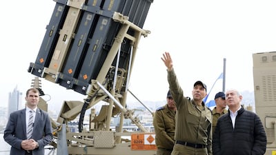 Israel Prime Minister Benjamin Netanyahu views a naval Iron Dome defence system, installed on a Lahav Class corvette of the Israeli Navy, in 2019. AP Photo