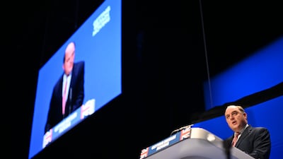 Mr Wallace speaks at the annual Conservative Party conference in October. Getty Images
