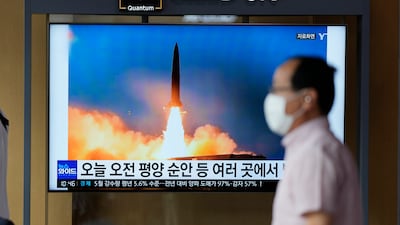 A news report about the latest North Korean missile launch is broadcast at a train station in Seoul, South Korea. AP
