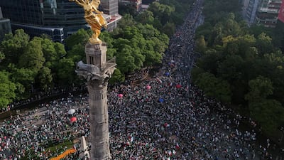Mexico fans gather at the Angel of Independence monument in the capital city to celebrate their win over South Africa in the World Cup. Reuters