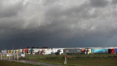 Lorries are seen parked at Manston International Airport, after EU countries imposed a travel ban from the UK following the coronavirus disease (COVID-19) outbreak, in Manston, Britain. REUTERS