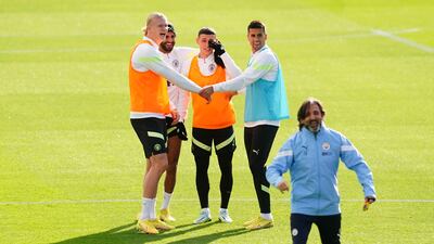 Erling Haaland, Riyad Mahrez, Phil Foden and Joao Cancelo during training. PA