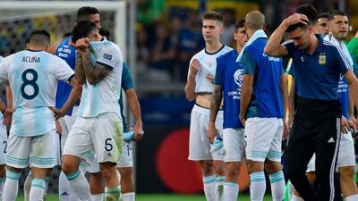 Argentina' manager Lionel Scaloni and players at the end of the match. AFP