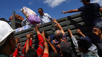 Survivors in Talat N'Yaaqoub receive much-needed aid after the earthquake that struck Morocco. Reuters
