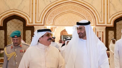 Sheikh Mohamed bin Zayed (right), bids farewell to King Hamad bin Isa Al Khalifa, King of Bahrain (left), at Presidential Airport. Mohamed Al Hammadi / Ministry of Presidential Affairs