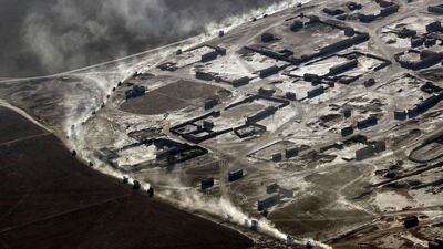 Displaced Iraqi civilians drive back to their village of Tall Abtah, near the city of Mosul after Iraqi forces retook the village from ISIL. AFP