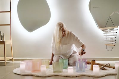 The massage is complemented by a sound therapist ringing out crystal singing bowls. Photo: The FaceRoom
