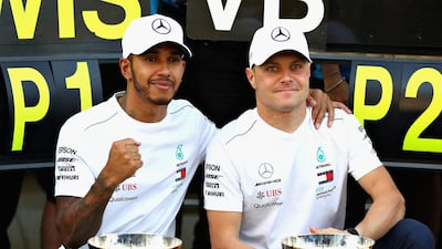 He may not have been happy winning the way he did in Russia, but Lewis Hamilton, left, has seen his title hopes strengthened thanks to the Mercedes-GP team orders that saw Valtteri Bottas asked to make way for him. Mark Thompson / Getty Images