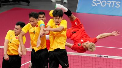 Action from Indonesia v Vietnam in the men's sepaktakraw match at the Asian Games in Jinhua, China. AP