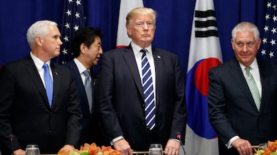 Japanese prime minister Shinzo Abe walks to his seat at a luncheon with president Donald Trump and South Korean president Moon Jae-in. AP Photo/Evan Vucci