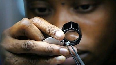 Do your homework and consider 10 key elements before investing in diamonds. AFP Photo / Alexander Joe