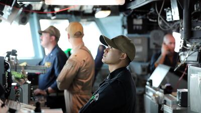 US sailors man the bridge.