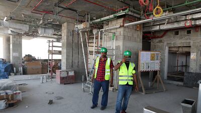 Hard at work on the Wasl Tower skyscraper. Pawan Singh / The National