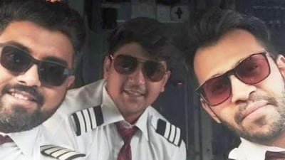 Capt Smit Machchhar, left, with friend and colleague Dharav Gosalia, right, and another colleague on a SpiceJet flight some years ago. Dharav Gosalia
