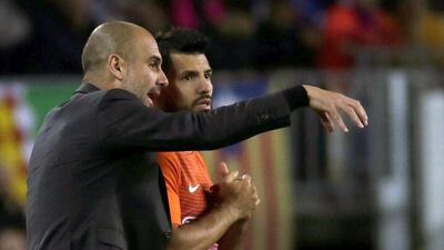 Pep Guardiola faces former club Barcelona on Tuesday night looking to avenge Manchester City's 4-0 defeat at the Camp Nou. Alberto Estevez / EPA