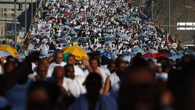 Muslim pilgrims arrive to throw pebbles at pillars during the "Jamarat" ritual, the stoning of Satan, in Mina near the holy city of Mecca, Saudi Arabia. Ahmad Gharabli / AFP
