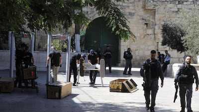 Israeli security at the main entrance to Al Aqsa mosque compound, in Jerusalem's Old City earlier this year. AFP / Menahem Kahana