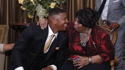 James Winston reacts with his grandmother Myrtle Winston to learning he is the first pick in the NFL draft Thursday, April 30. Hal Yeager / AP Photo