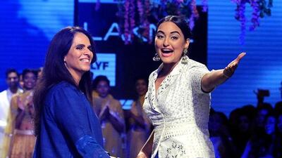 Anita Dongre, left, with Sonakshi Sinha at Lakmé Fashion Week. AFP