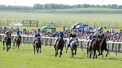 And they're off, at Newmarket's Rowley Mile course in London, England. Wam