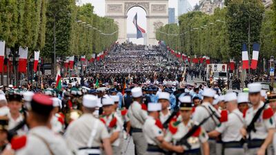 French troops prepare ahead of the parade. AFP