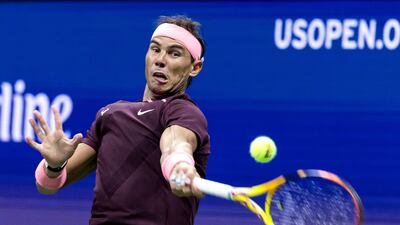Spain's Rafael Nadal hits a return to Australia's Rinky Hijikata. AFP