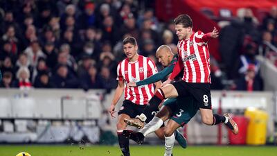 Mathias Jensen 7: Had right-footed strike deflected over bar by Fabinho as Brentford hunted for second first-half goal, which did arrive when the Danish midfielder’s perfect cross picked out Wissa who headed home just before break. PA