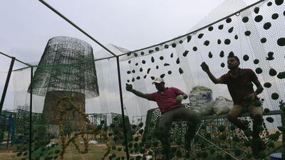 The majority-Buddhist nation is aiming to beat the world record for the tallest, artificial Christmas tree as a show of multicultural respect. Eranga Jayawardena/AP Photo