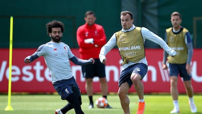 Liverpool's Mohamed Salah (left) and Xherdan Shaqiri during the press day at Melwood Training Ground, Liverpool. PA Wire.