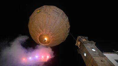 The world's largest paper balloon takes off on its 150th birthday to celebrate the feast of San Roque and satirise politicians, in Betanzos, Spain. EPA