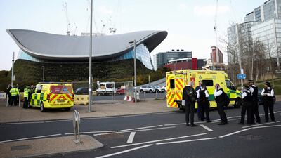 Emergency crews at Queen Elizabeth Olympic Park in Stratford, east London, after a leak of noxious fumes. Reuters
