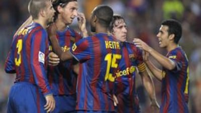 Zlatan Ibrahimovic, second left, is congratulated by his Barca teammates after scoring his first goal for the club since his arrival from Inter Milan.