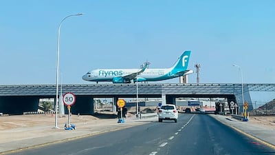 A Flynas plane lands at King Khalid International Airport in Riyadh. AFP