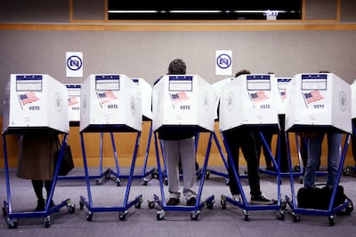 Voters fill out their ballots at a polling station in New York City on Election Day last year. A wide range of polls have established just how extensive the changes in attitudes towards Israel are. AFP