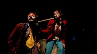 Hazem Zidan, left, and Lama Badour at al-Hamra Theatre. EPA