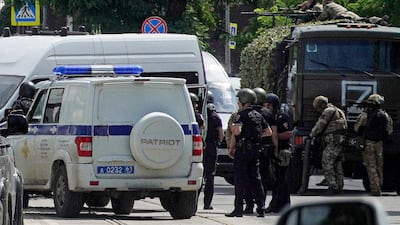 Russian police and security officers in the Rostov region. Authorities say the prisoners behind the incident were 'eliminated'. AP