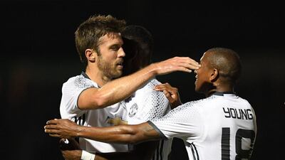 Michael Carrick of Manchester United celebrates scoring his side’s first goal. Shaun Botterill / Getty Images
