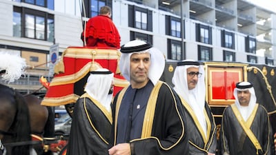 His Excellency Mansoor Abulhoul following his visit with Her Majesty The Queen at Buckingham Palace for the presentation of diplomatic credentials. Seen here with his wife in red with black hat, Victoria Devin and the Assistant Marshal of the Diplomatic corps with feathers in hat. Outside the Lanesborough Hotel in central London where the reception HE Mansoor Abulhoul's Vin d'honneur took place.