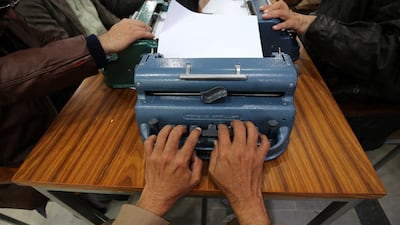Visually impaired men learning to read Braille at the Government School and Institute for the Blind in Peshawar, Pakistan, on the eve of the International Day of People with Disabilities. EPA