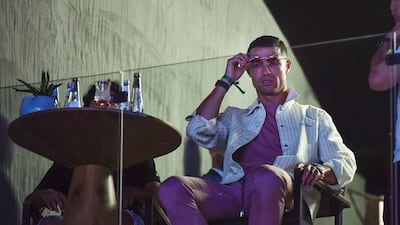Al Nassr and Portugal striker Cristiano Ronaldo attends the boxing match between Tommy Fury and Jake Paul at Diriyah Arena, Saudi Arabia, February 27, 2023. AP Photo