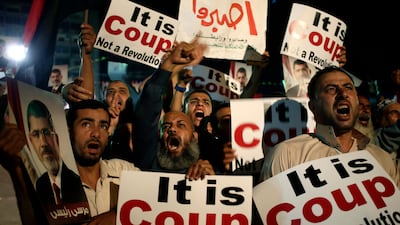 At least 72 Brotherhood supporters were shot dead by security forces on Saturday near the vigil, deepening the turmoil convulsing the country since the army shunted Morsi from power on July 3. Hassan Ammar / AP Photo