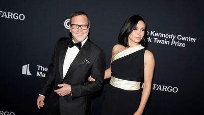 Rob Schneider and wife Patricia Azarcoya. Reuters