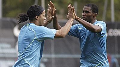 Ronaldinho, left, and Eto'o won the Champions League together in their time at Barcelona.
