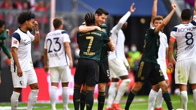 Munich's Robert Lewandowski and Serge Gnabry celebrate. EPA